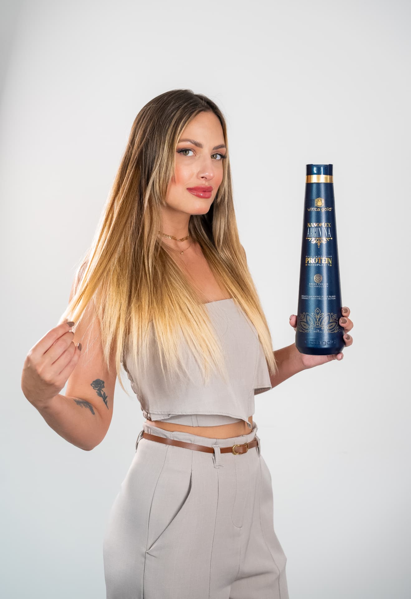 Model with smooth, glossy hair after a professional Nanoplastia service